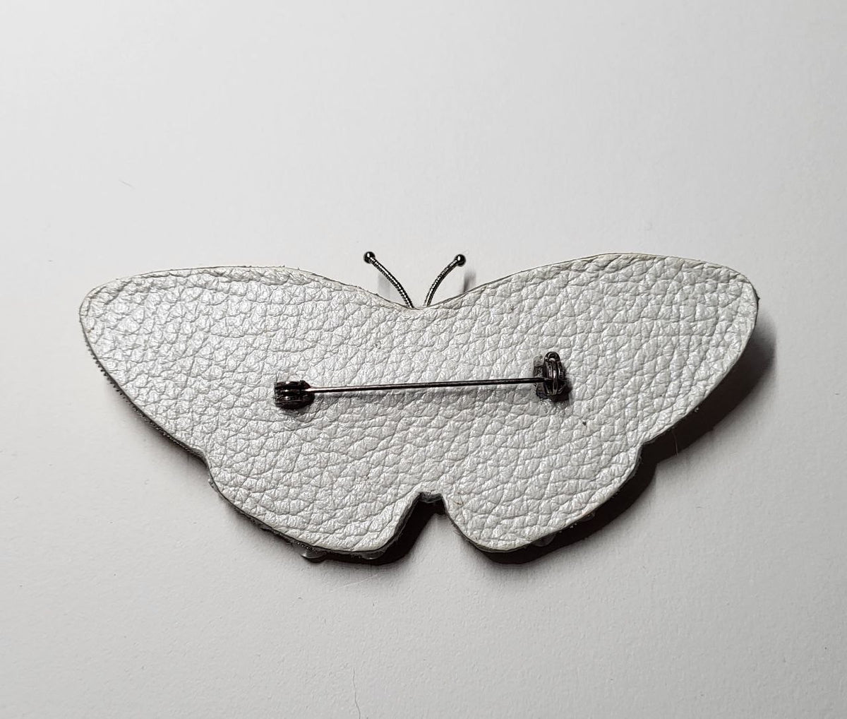 Broszka SYMBOL Motyl Vintage Silver
